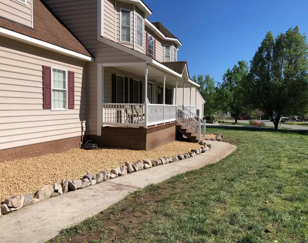 house with rock edge border flower bed and rock fill in chesterfield va